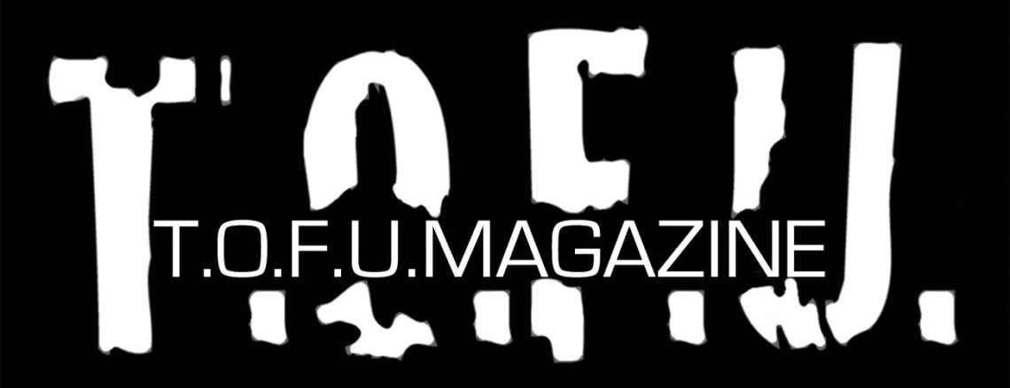 Image contains a black background with large white text that says "T.O.F.U." in white, and centred within that text there is smaller text that says "T.O.F.U. Magazine".